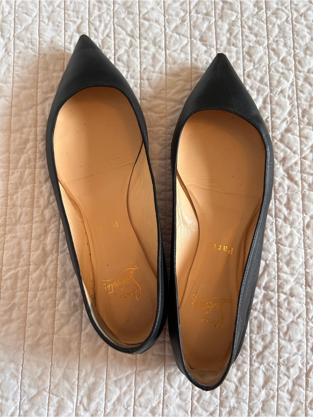 Christian Louboutin Ballala iconic pointy black leather flats.